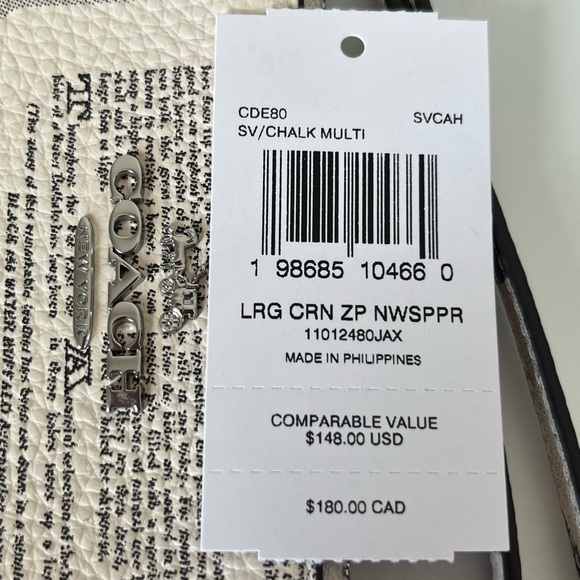 Coach Large Corner Zip Wristlet With Newspaper Print🎈🎈
